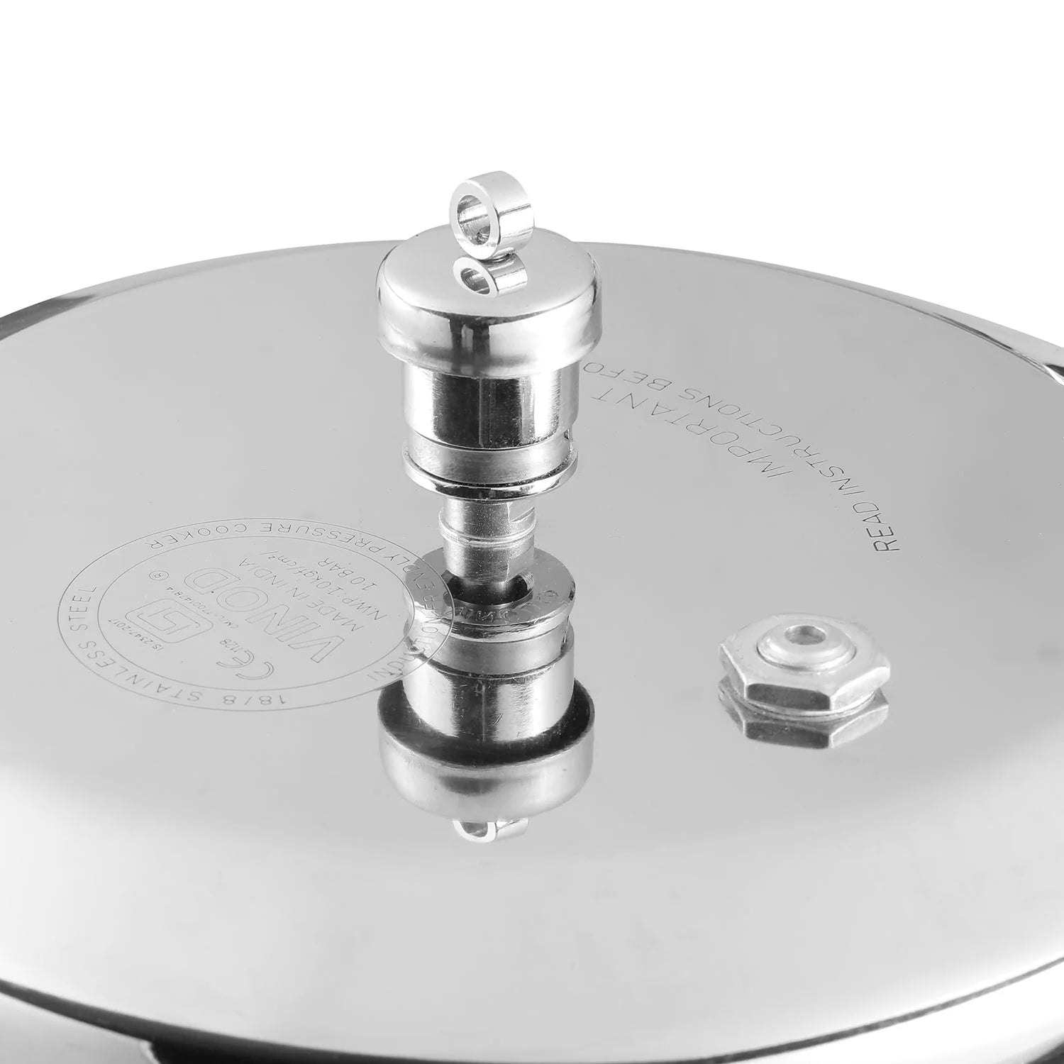 Close-up of a stainless steel pressure cooker lid with a valve on a white background