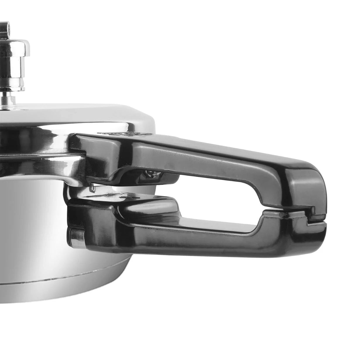 Close-up of a pressure cooker lid with a handle