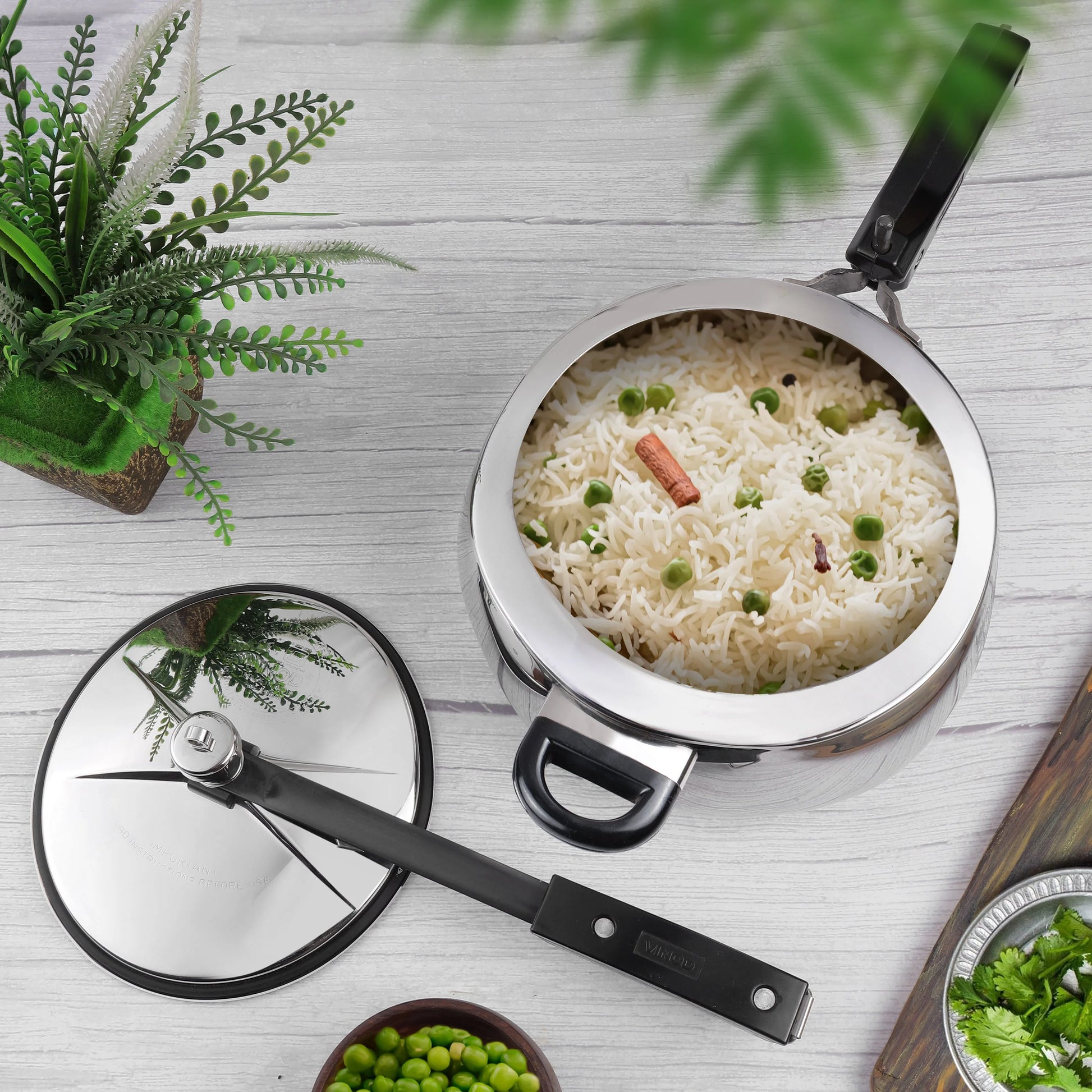 Top View of 2 liters stainless steel pressure cooker with rice in it