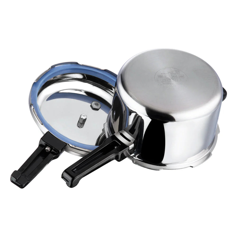 Bottom of Stainless steel pressure cooker with lid on a white background