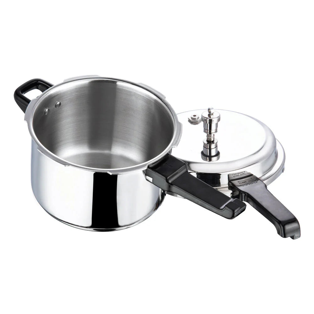 Stainless steel pressure cooker on a white background