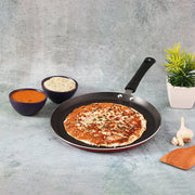 Perfect golden dosa being cooked on Vinod Popular Non Stick Dosa Tawa demonstrating excellent food release and even browning